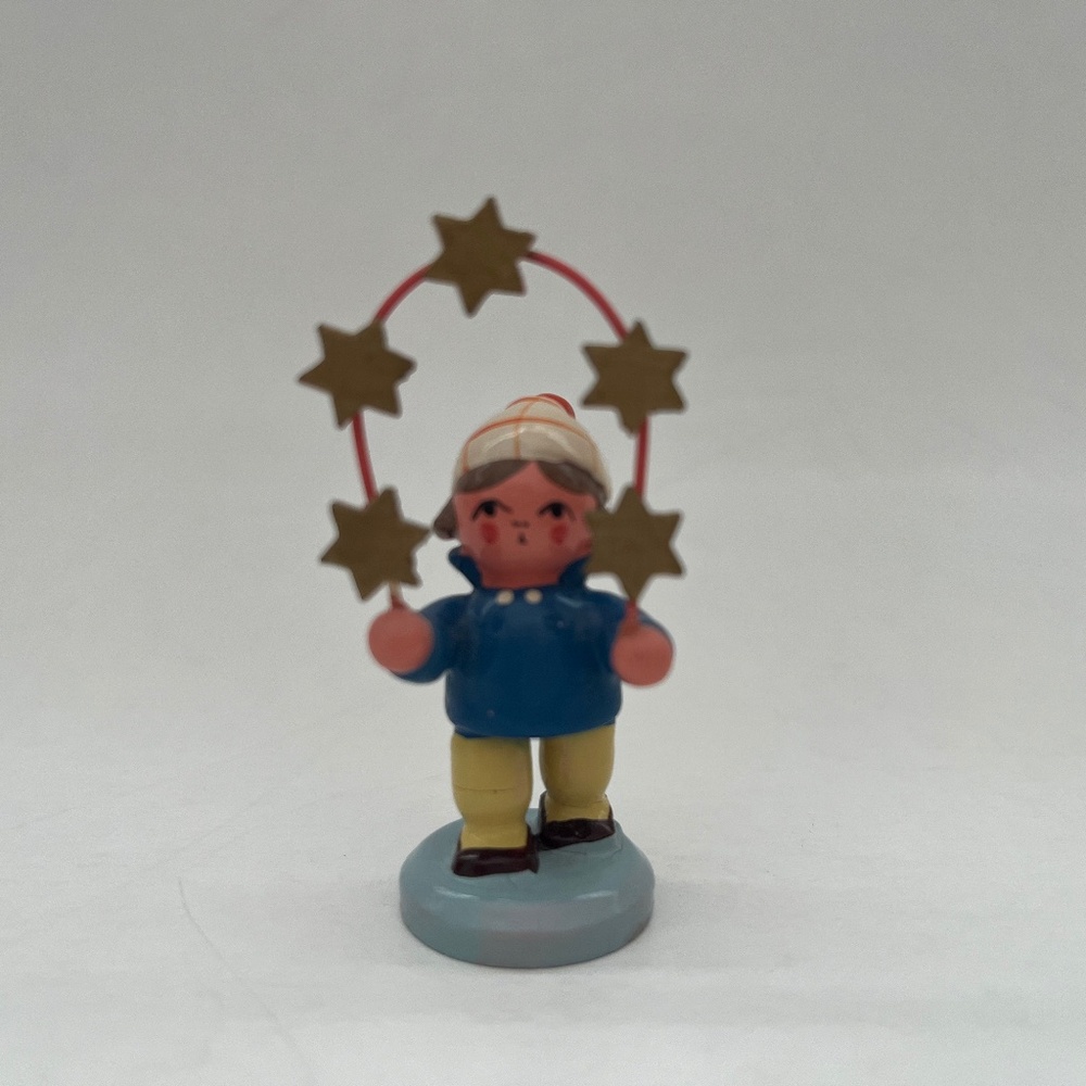 ERZGEBIRGE BOY FIGURE WITH STARS